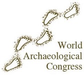 The logo of the World Archaeological Congress (WAC). A set of bare footprints track from the bottom left to the top right. Beneath them is the full organization title.
