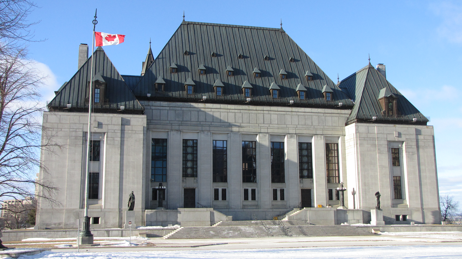 Supreme Court of Canada from the front on a fall day.