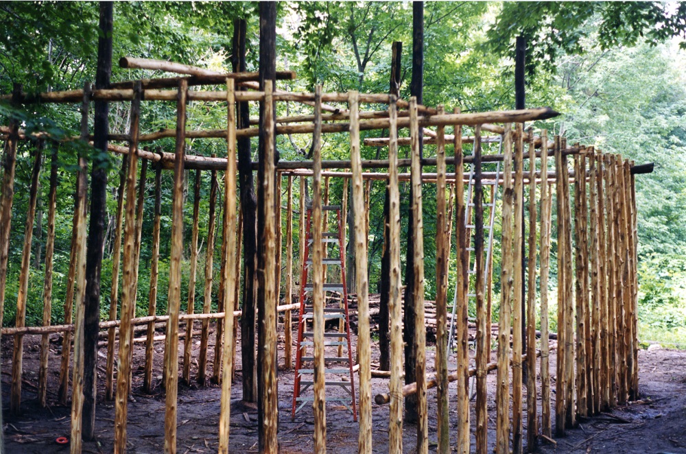 A 2002 image of the frame of a small longhouse under construction at the Lawson Site