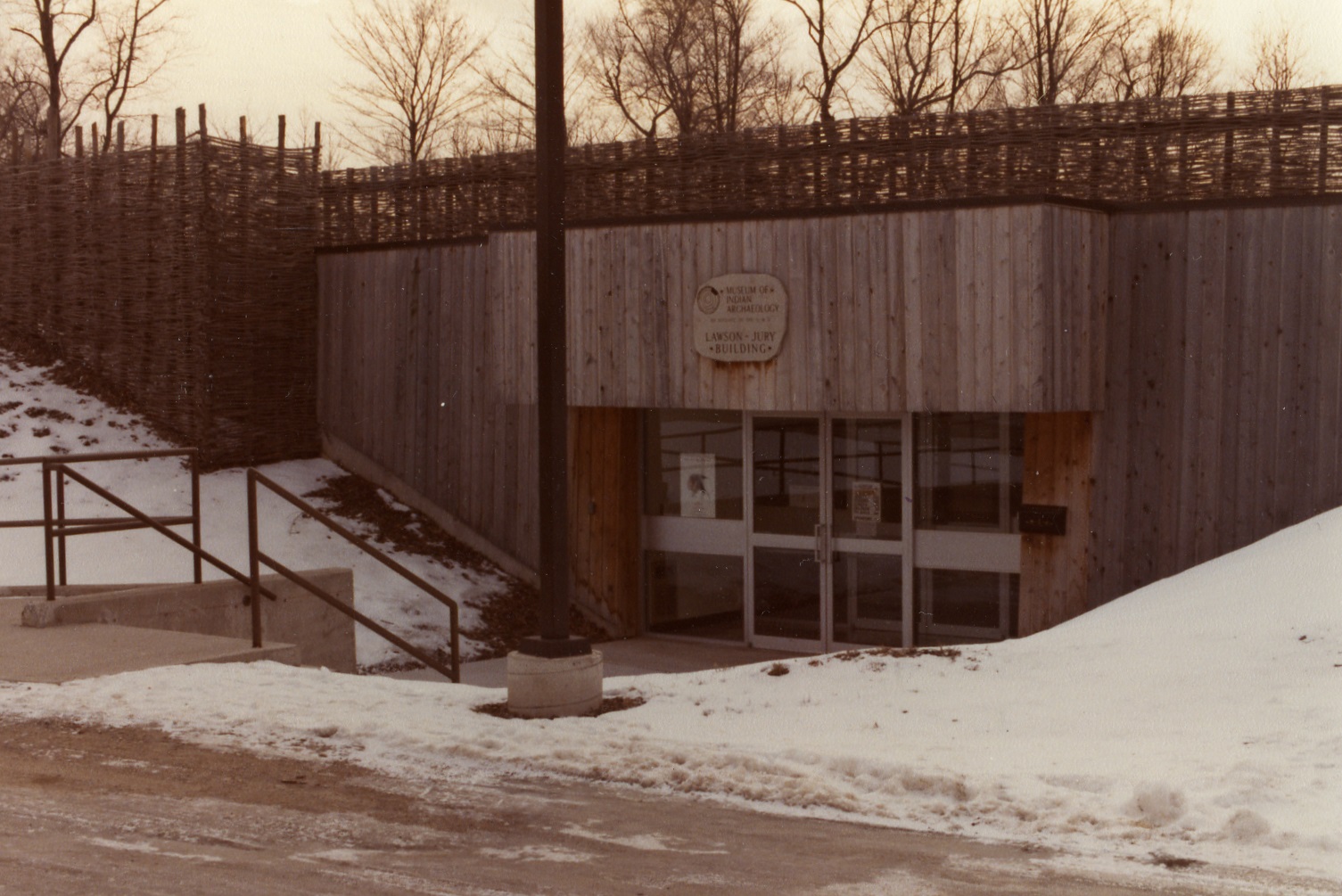 The 1980s era entrance of the Museum of Ontario Archaeology. The original name "Museum of Indian Archaeology" and the "Lawson-Jury Building" appear on the sign above the door.